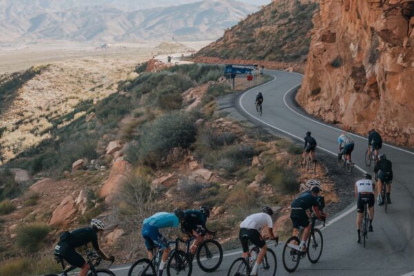 Cyclist riding along Toro Canyon Road during a scenic climb