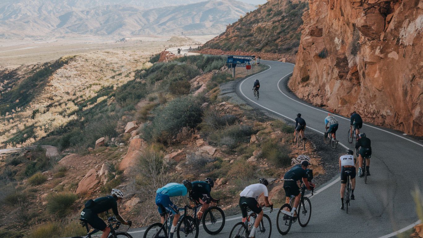 Cyclist riding along Toro Canyon Road during a scenic climb