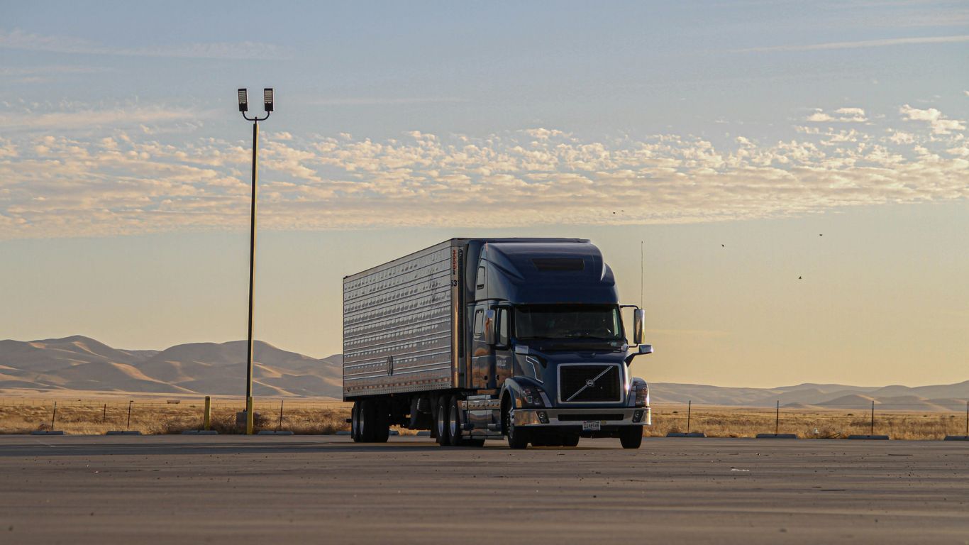 2009 Chevrolet C6500 box truck 13'6" on a highway